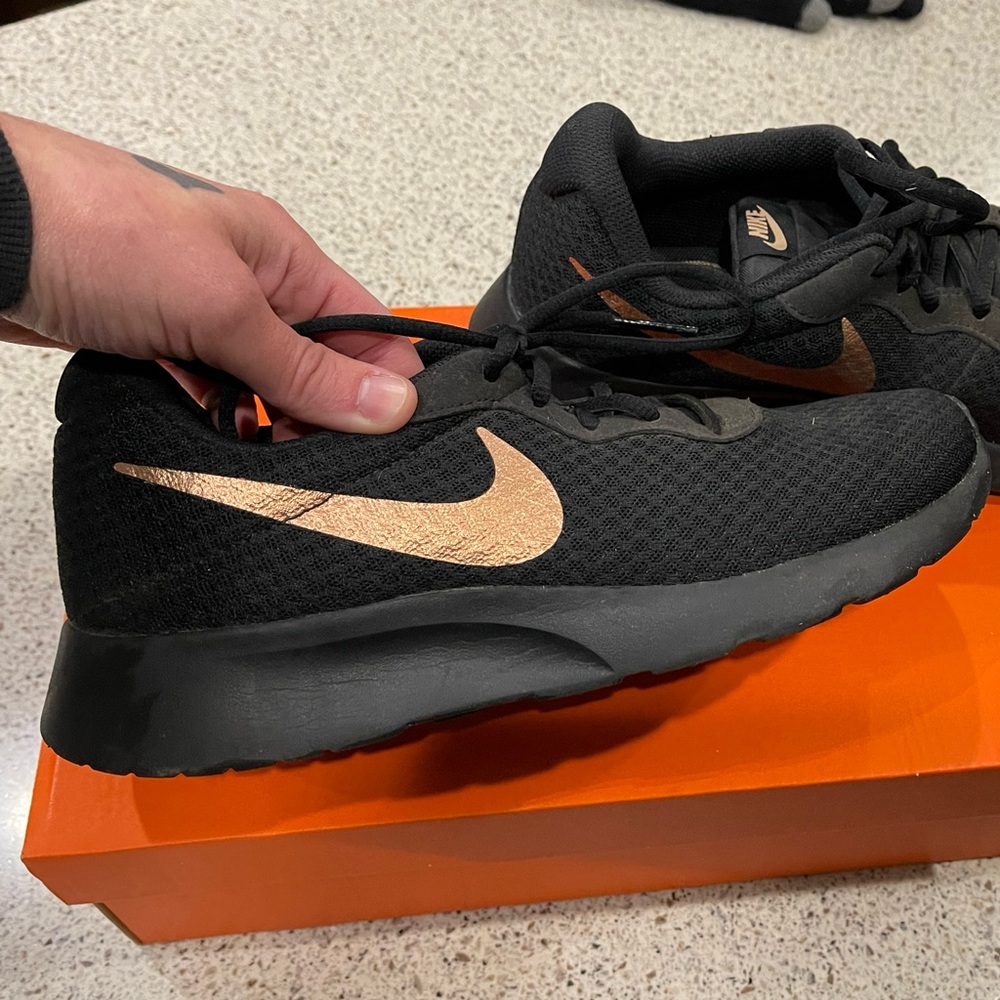 Black/rose gold Nikes